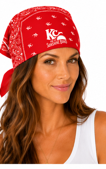A woman wearing a red bandana with white paisley patterns and the white printed text 'KC and the Sunshine Band'.