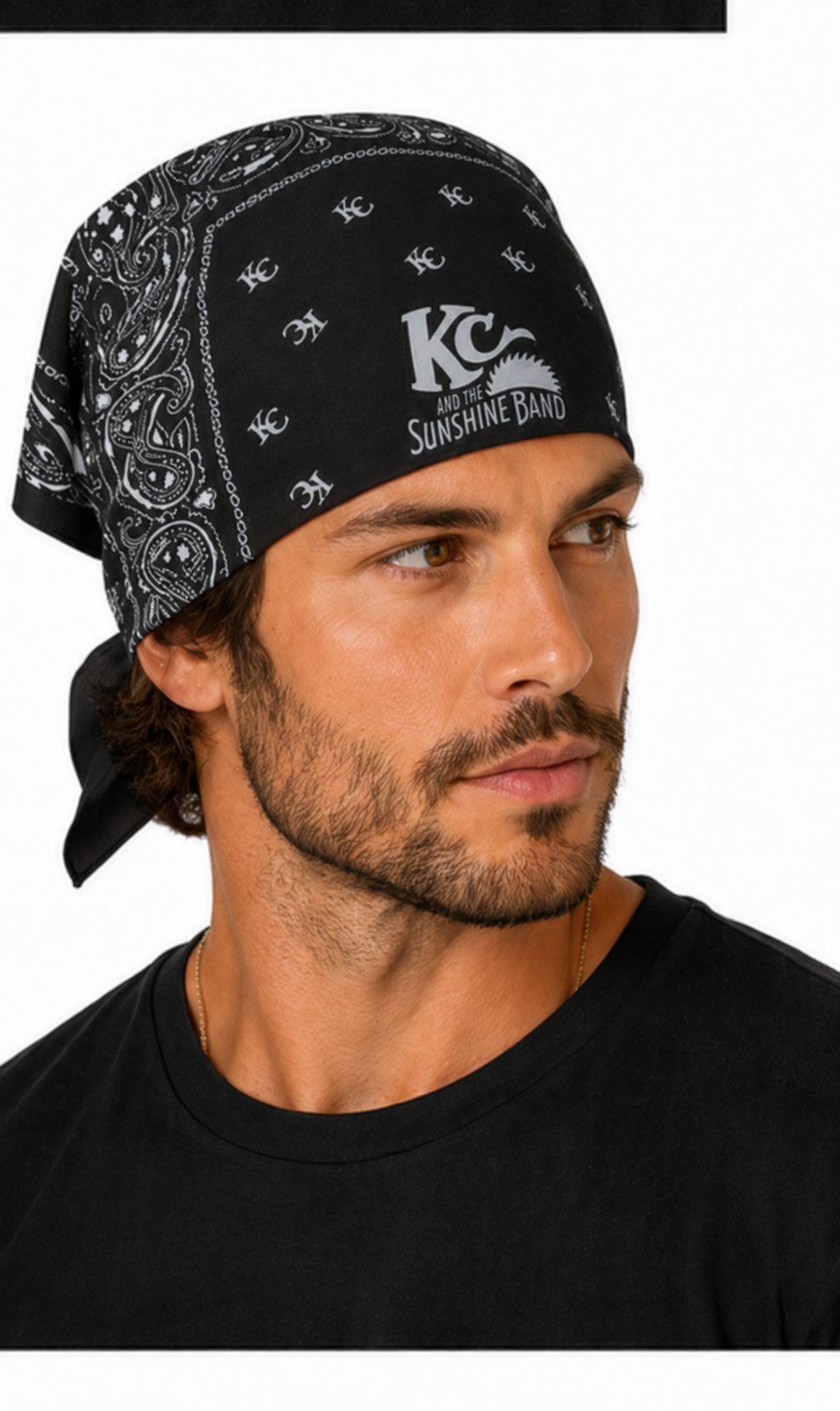 A man wearing a black bandana with a white paisley pattern and a white 'KC and the Sunshine Band' logo on the front, shown in a close-up profile shot against a white background.