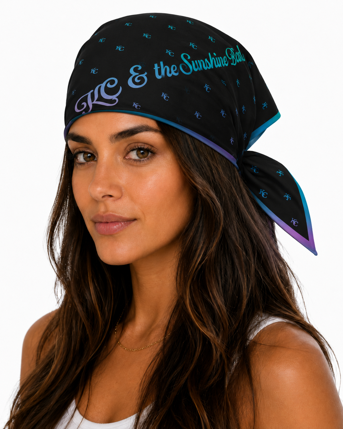 A woman wearing a black bandana headscarf with blue KC logo patterns, turquoise and purple script text reading 'KC & the Sunshine Band', and a purple-to-blue gradient edge, photographed against a plain white background.